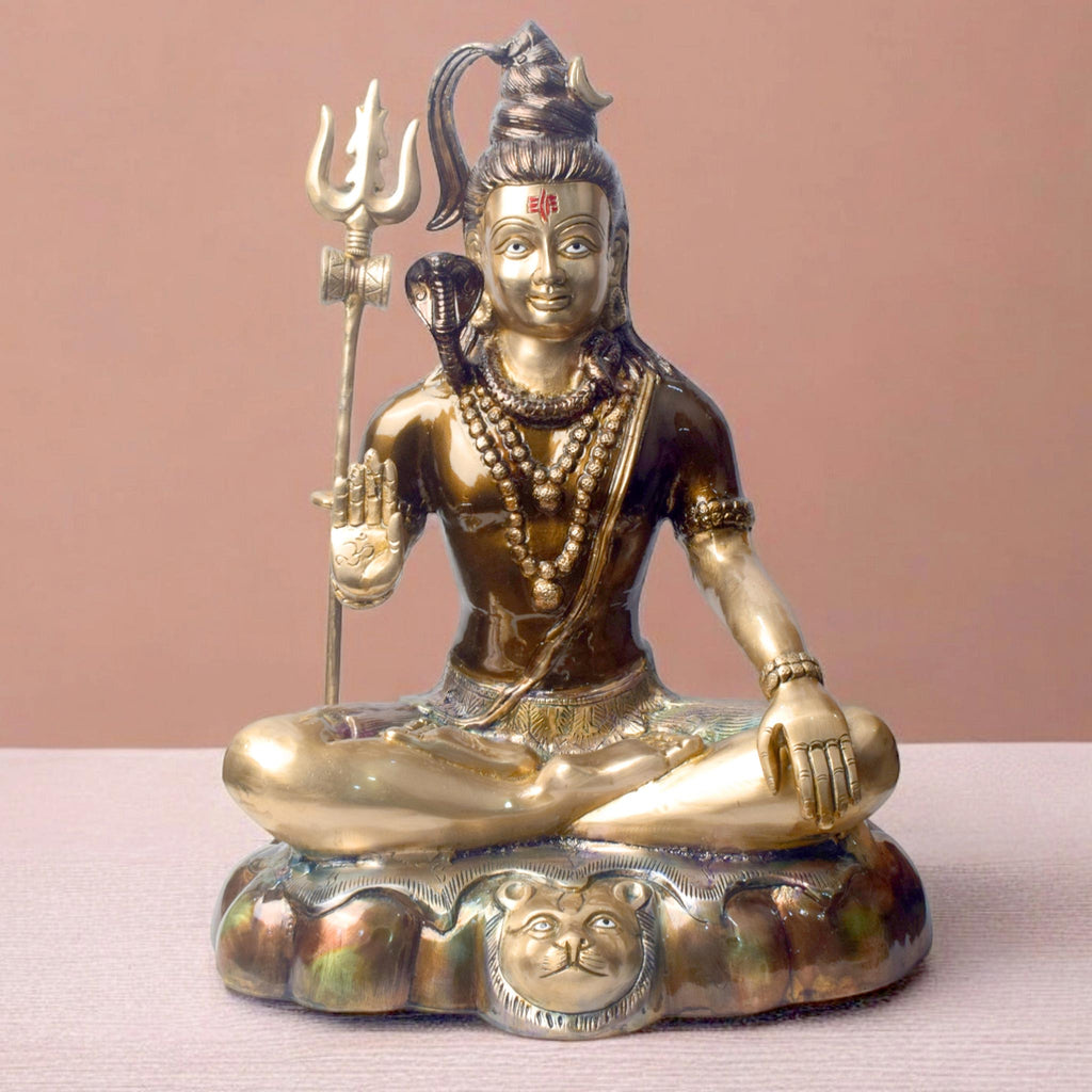 Embodying peace and spiritual focus, this 17-inch Brass Shiva Idol features Lord Shiva in a serene meditative posture. Known as the ultimate yogi, Lord Shiva is beautifully represented here with intricate detailing in brass, capturing the tranquility and profound wisdom of his meditation.