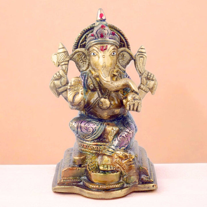  The "5.1 Inch Divine Ganesh Idol" is a beautifully crafted statue symbolizing wisdom, prosperity, and the removal of obstacles. Standing at 5.1 inches tall, this idol captures the serene and auspicious presence of Lord Ganesha, the beloved Hindu deity known for bringing good fortune and success. 