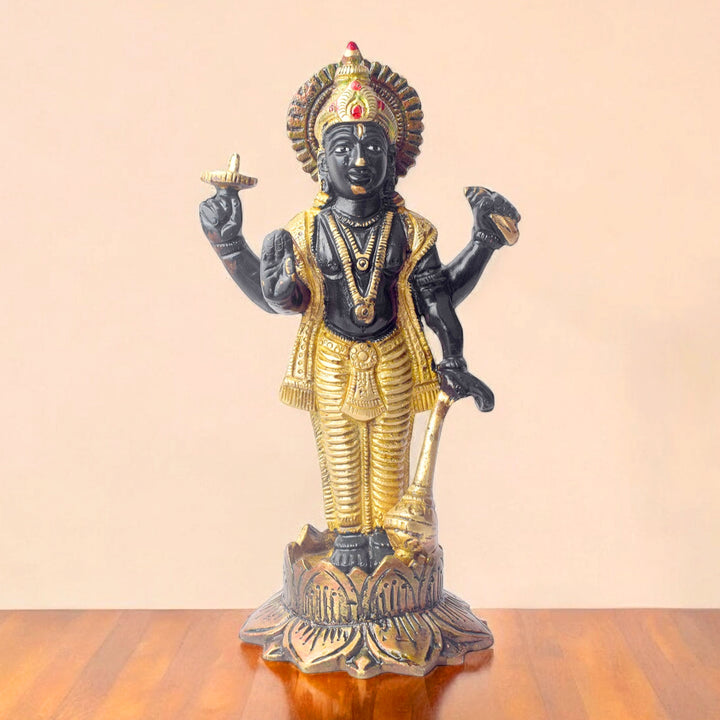 This elegant brass statue of Lord Vishnu seated on the mighty Seshnag is a powerful symbol of divine protection, balance, and cosmic order. The intricate craftsmanship beautifully depicts Lord Vishnu in his serene and majestic form, with the multi-headed Seshnag providing a protective canopy.