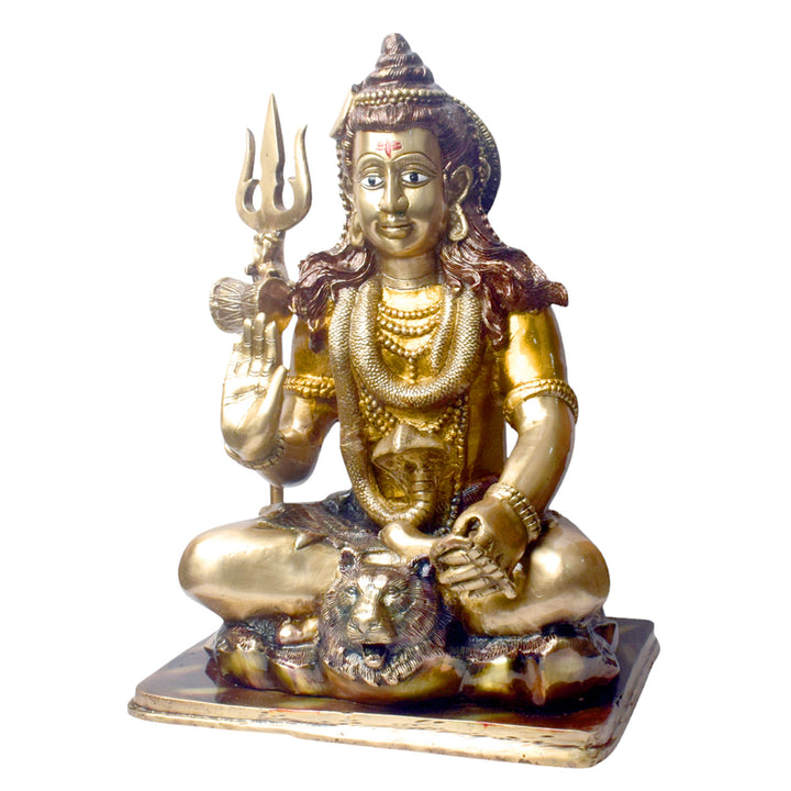 Embodying peace and spiritual focus, this 17.5-inch Brass Shiva Idol features Lord Shiva in a serene meditative posture. Known as the ultimate yogi, Lord Shiva is beautifully represented here with intricate detailing in brass, capturing the tranquility and profound wisdom of his meditation.