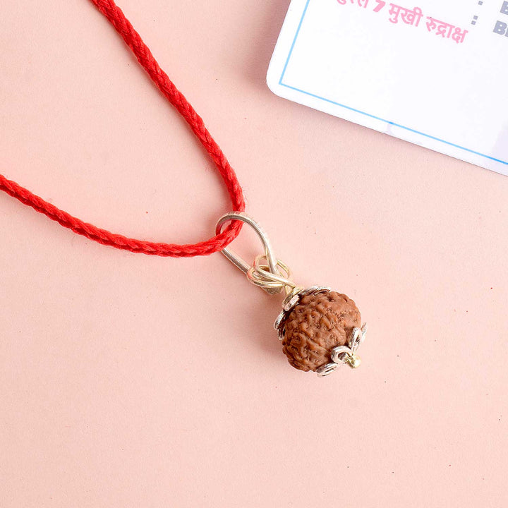 Certified 7 Mukhi Rudraksha Pendant with metal cap for prosperity and balance. India’s Premium Rudraksha Jap Mala Store- www.satvikstore.in
