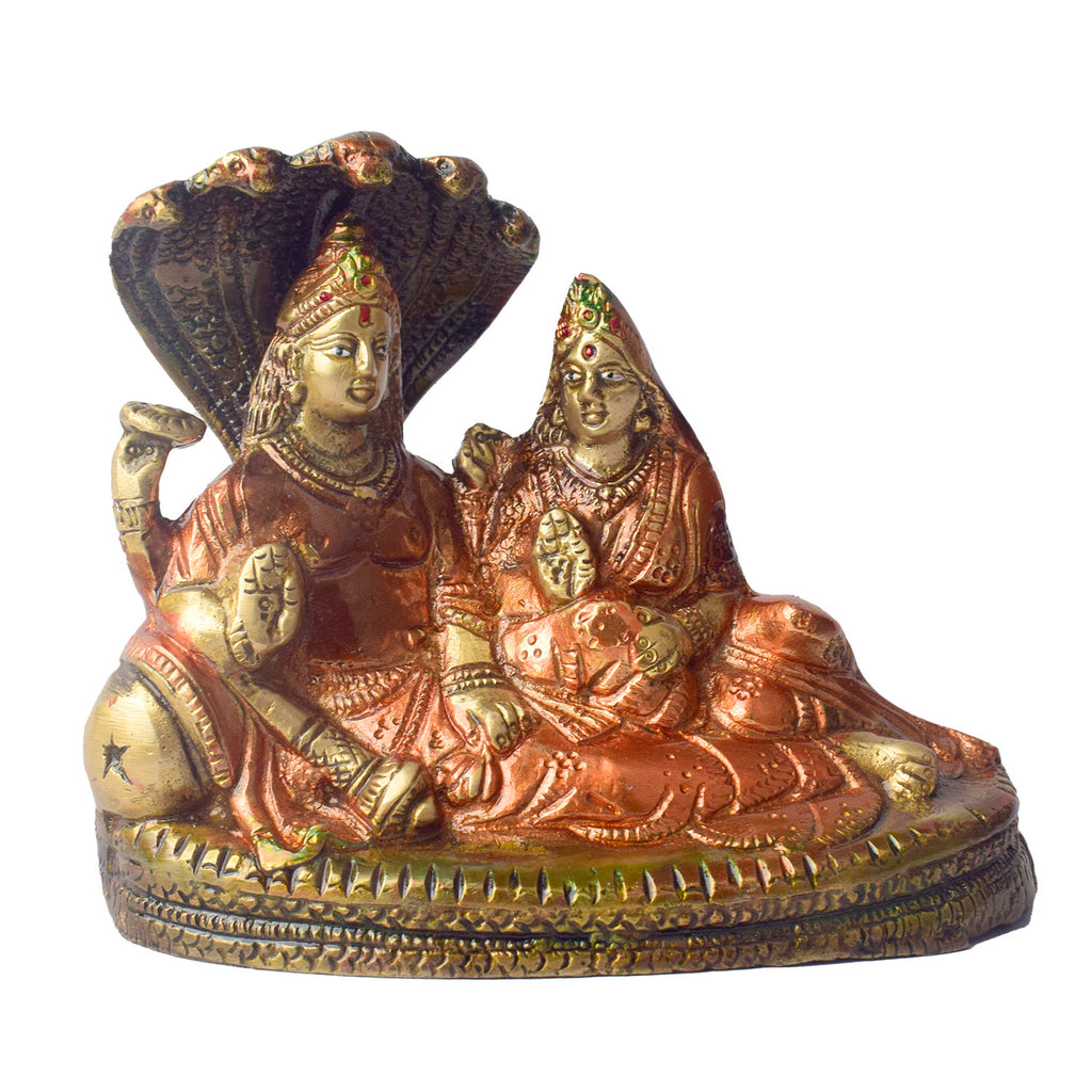  The 4.7 Inch Vishnu Ji Resting on Snake - Small Divine Figure is a beautifully crafted miniature statue that showcases Lord Vishnu in a serene and tranquil pose. Resting gracefully on the multi-headed serpent, Sheshnag, this divine figure symbolizes the eternal peace and protection Vishnu provides to the universe. 