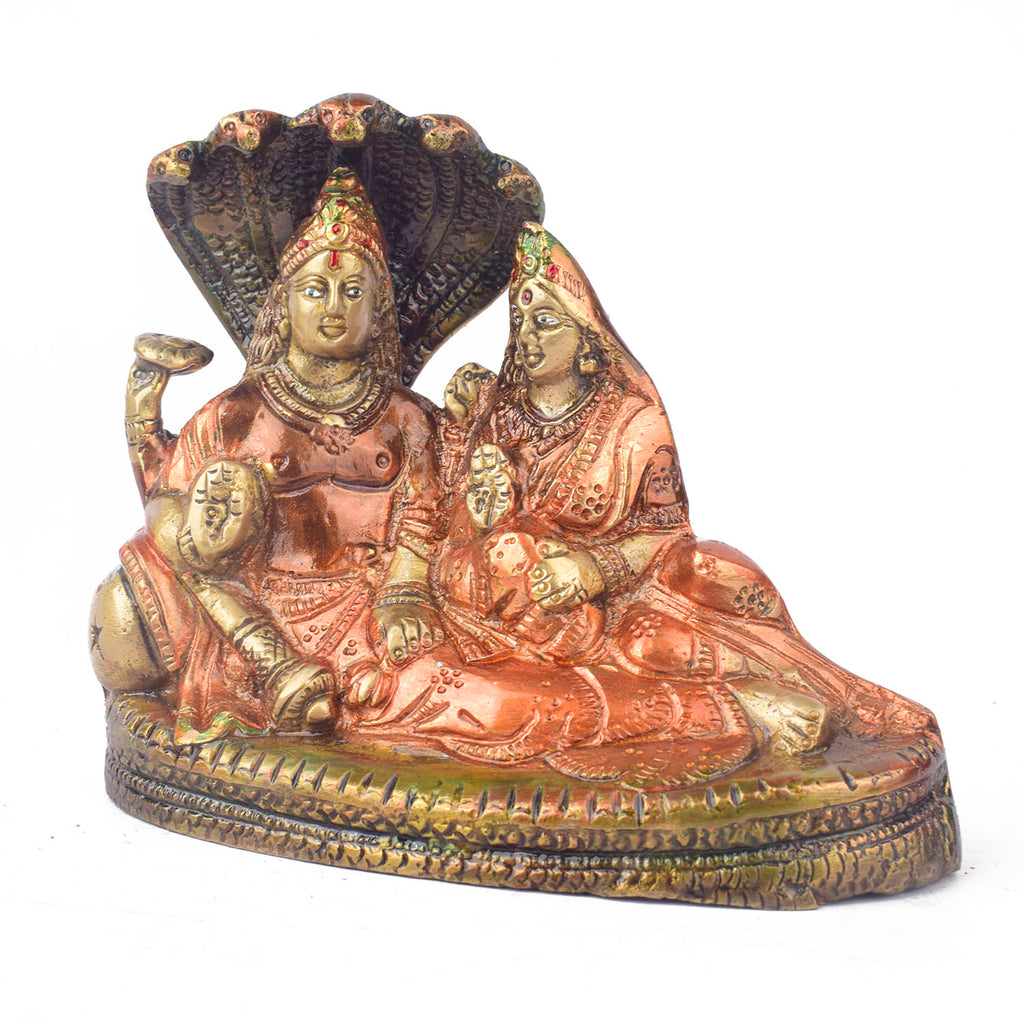  The 4.7 Inch Vishnu Ji Resting on Snake - Small Divine Figure is a beautifully crafted miniature statue that showcases Lord Vishnu in a serene and tranquil pose. Resting gracefully on the multi-headed serpent, Sheshnag, this divine figure symbolizes the eternal peace and protection Vishnu provides to the universe. 