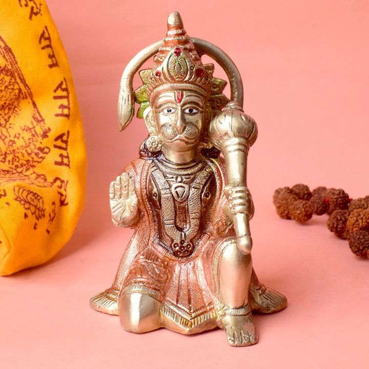 The "5.3 Inch Handcrafted Brass Hanuman Idol" is a meticulously crafted statue that beautifully captures the essence of Lord Hanuman’s strength, devotion, and protection. Standing at 5.3 inches tall, this idol is made from high-quality brass and features exquisite handcrafted detailing,