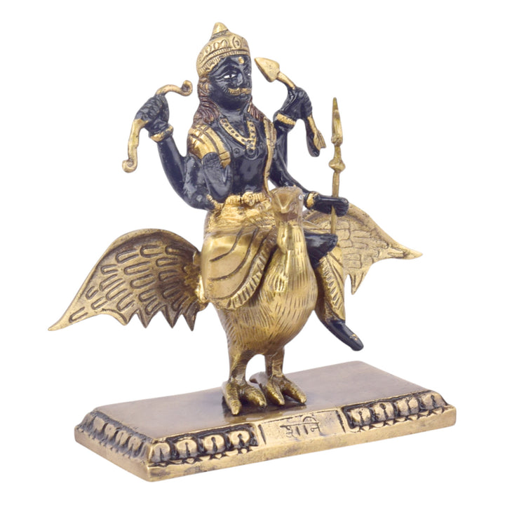  The 6.7 Inch Brass Shani Dev Idol Symbol of Justice and Protection is a beautifully crafted piece that embodies the powerful qualities of Shani Dev, the celestial deity of justice, discipline, and protection. Made from high-quality brass, this idol features Shani Dev in a detailed and commanding posture, symbolizing his ability to bring balance, fairness, and spiritual protection to those who seek his blessings. 