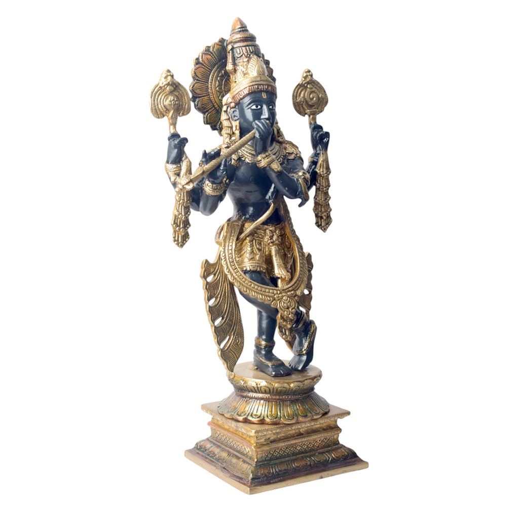 Bring home the divine charm of Lord Krishna with this exquisite 19-inch Brass Chola Krishna Sculpture. Expertly crafted, this statue captures Lord Krishna in his iconic pose, gracefully playing the flute.