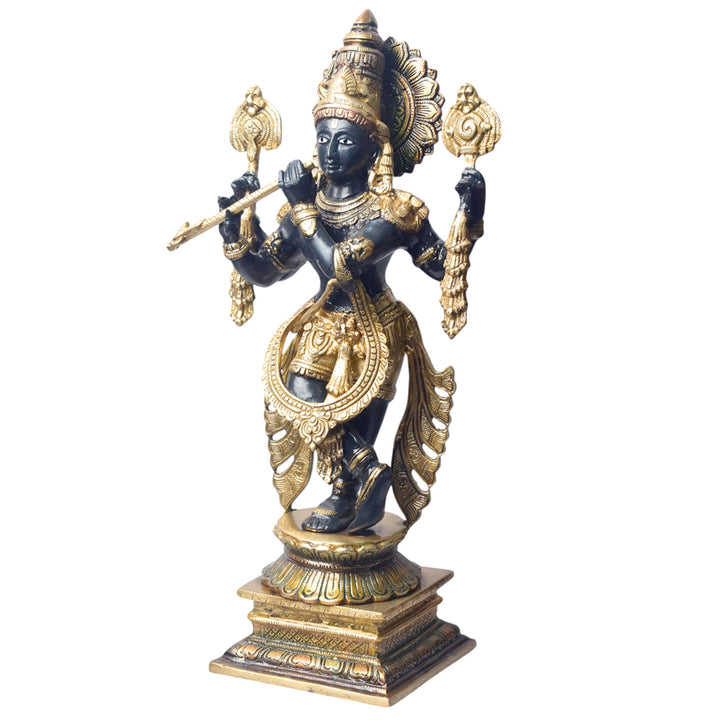 Bring home the divine charm of Lord Krishna with this exquisite 19-inch Brass Chola Krishna Sculpture. Expertly crafted, this statue captures Lord Krishna in his iconic pose, gracefully playing the flute.